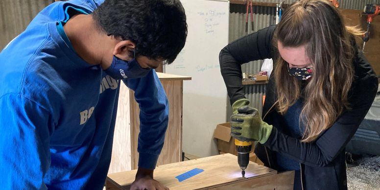 Two students building a nesting box at Cache Creek Nature Preserve