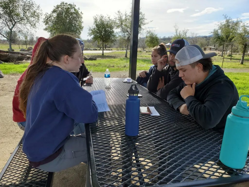 Students at an outdoor picnic table at Capay Open Space Park
