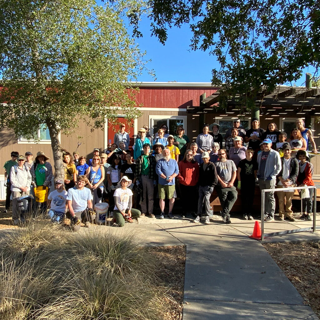 Around 60 volunteers in front of the Nature Preserve's new office module