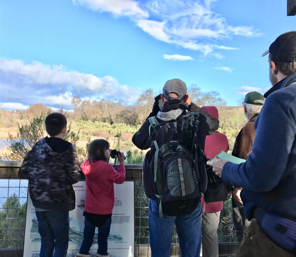 Image of birders observing from wetland overlook at Cache Creek Conservancy